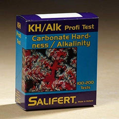 Salifert KH/Alk test kit contents with color comparator for precise reef water testing.