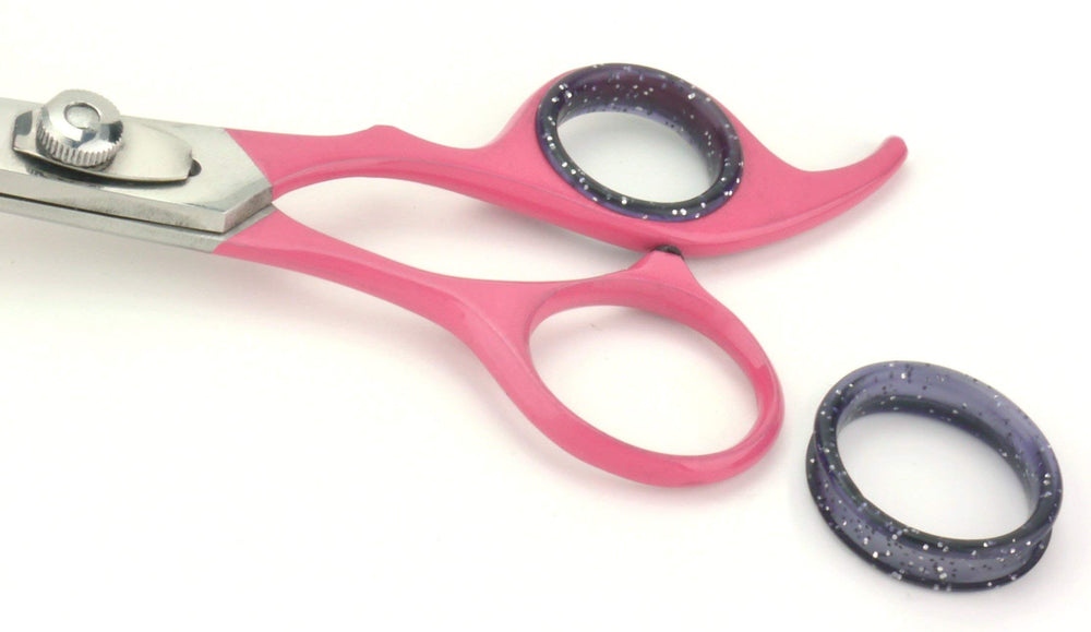 Scaredy Cut soft gel finger inserts provide a comfortable grip during grooming.