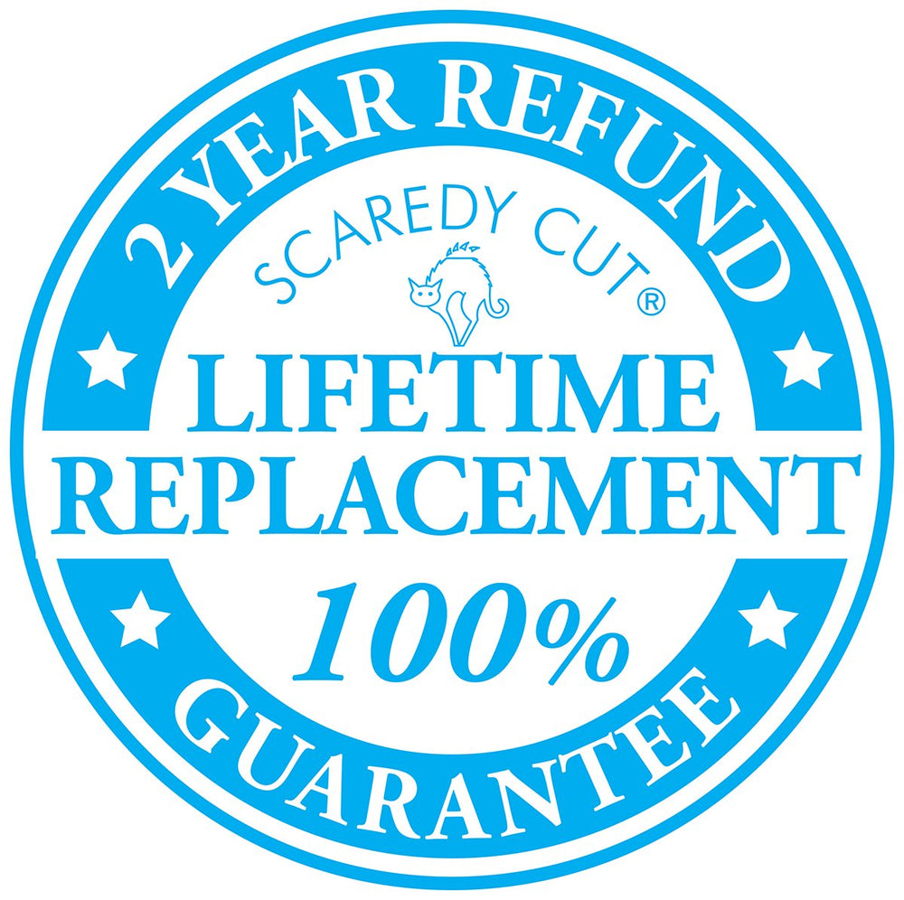 Scaredy Cut Tiny Trim ball-tipped scissor shown for safe ear and paw grooming