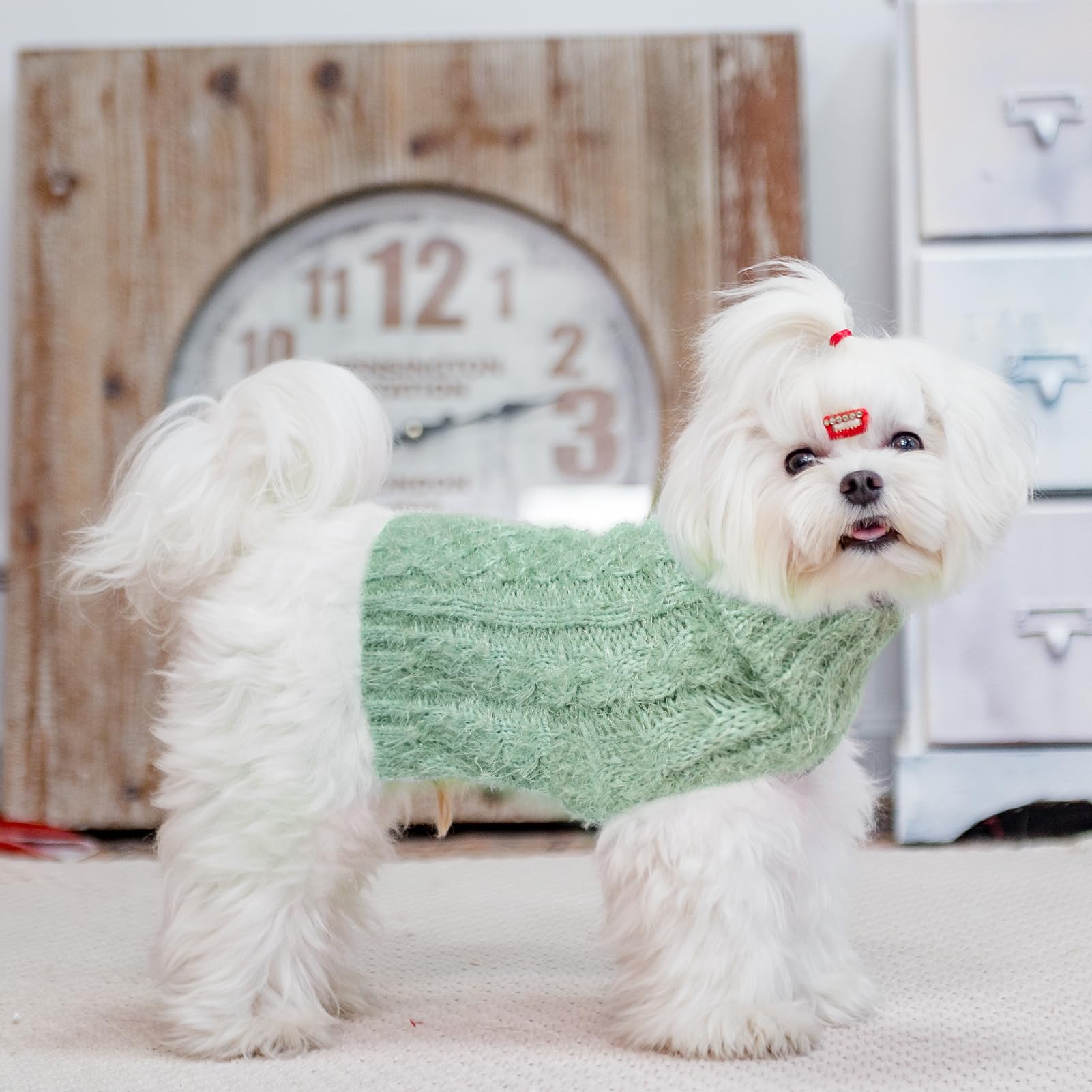SCIROKKO model wearing sweater while walking outdoors for winter wear practicality.
