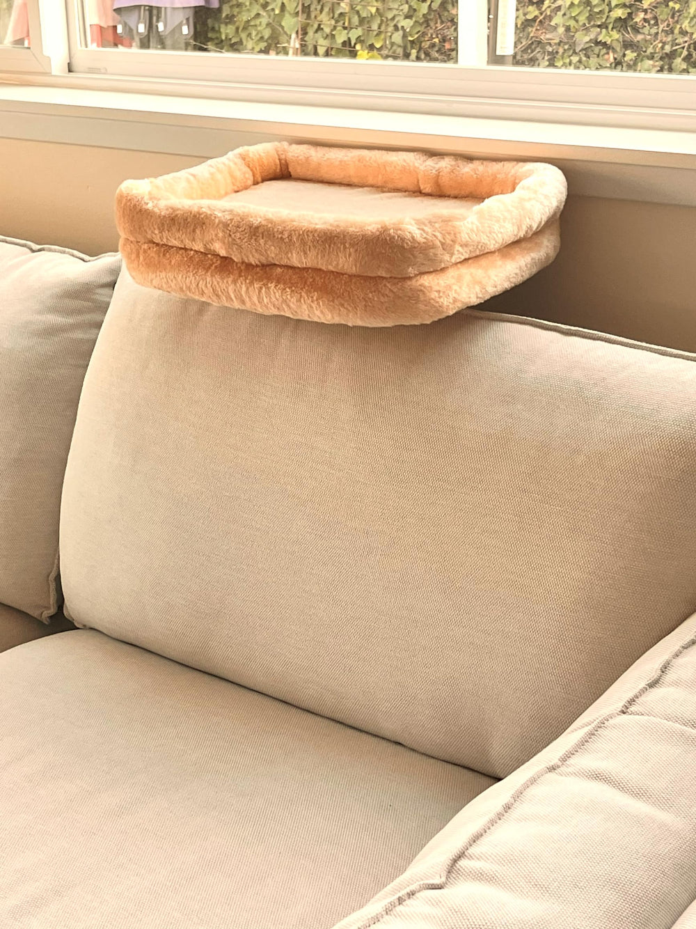 SCPW24 cushion protector cat bed installed on sofa with dual posts visible