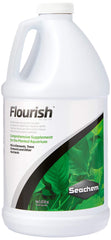 Seachem Flourish bottle pouring into an aquarium to support healthy plant growth.