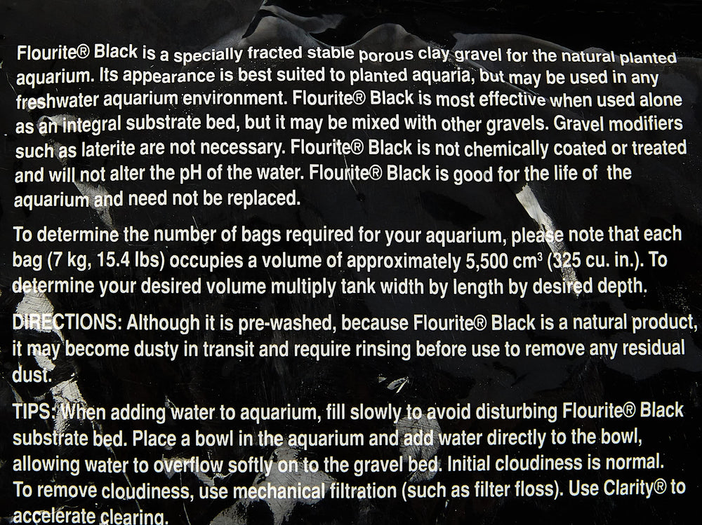 Seachem Flourite Black gravel closeup highlighting its porous texture for stable nutrient binding.