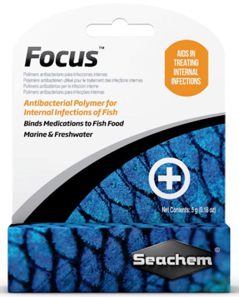 Seachem Focus bottle pour demonstrates a medicated food binder improving delivery to fish