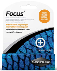 Seachem Focus bottle pour demonstrates a medicated food binder improving delivery to fish