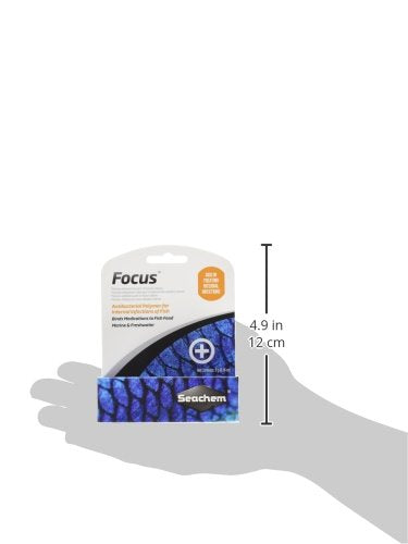 Seachem Focus powder dispense demonstrates palatability-friendly medication delivery for fish.