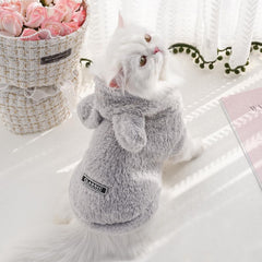 Selena bunny ears costume dog side view highlighting playful style and warmth