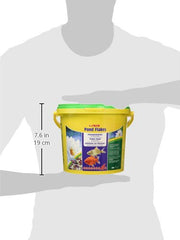 Sera pond flakes floating flakes closeup demonstrates long-lasting buoyancy.