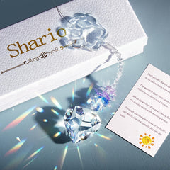 Shario paw-etched crystal suncatcher captures light with a paw design for cherished dog memories.
