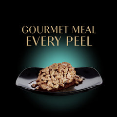 Sheba Perfect Portions chicken cuts in gravy close-up, tender meat with savory gravy.