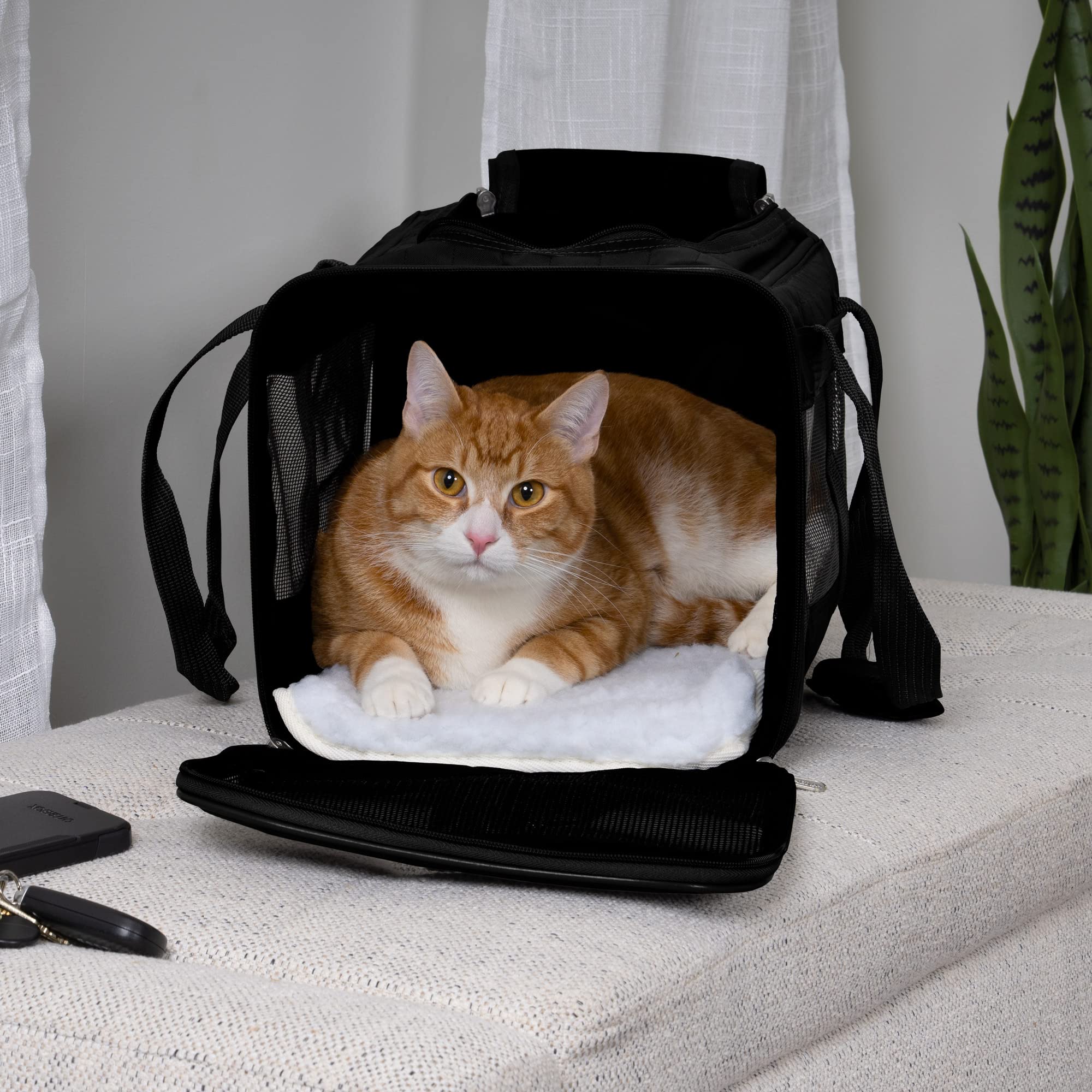 Sherpa Original Deluxe Medium carrier ventilation mesh highlights breathable transport for pets