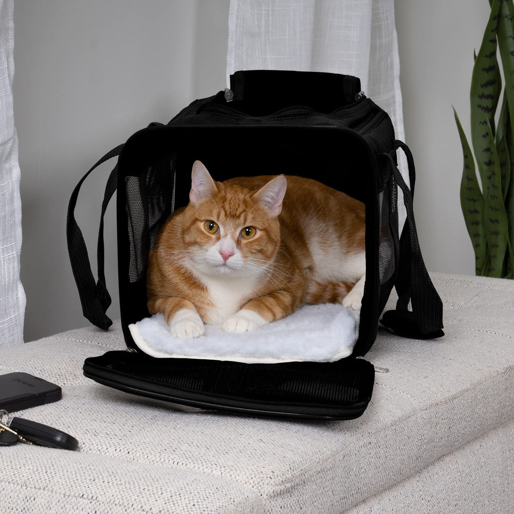 Sherpa Original Deluxe Medium carrier ventilation mesh highlights breathable transport for pets