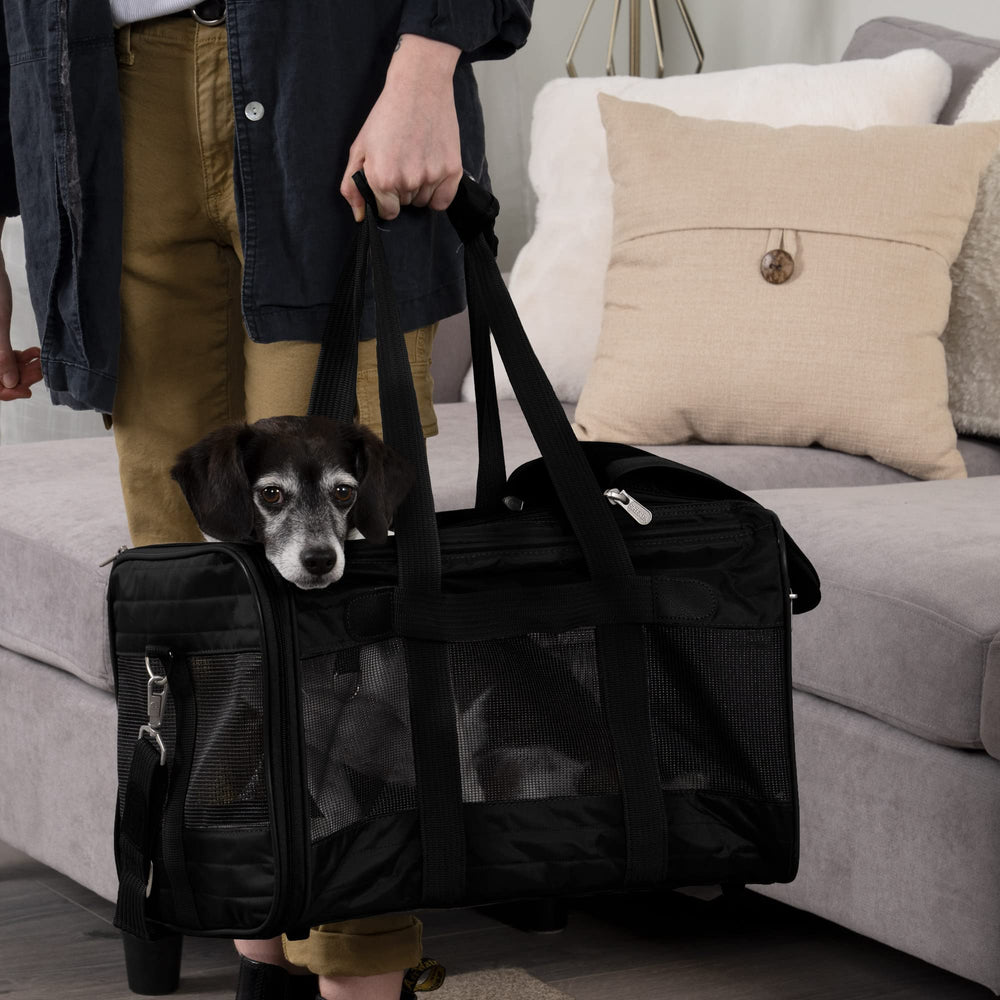 Sherpa Original Deluxe Large Carrier demonstrates breathable mesh panels for pet comfort