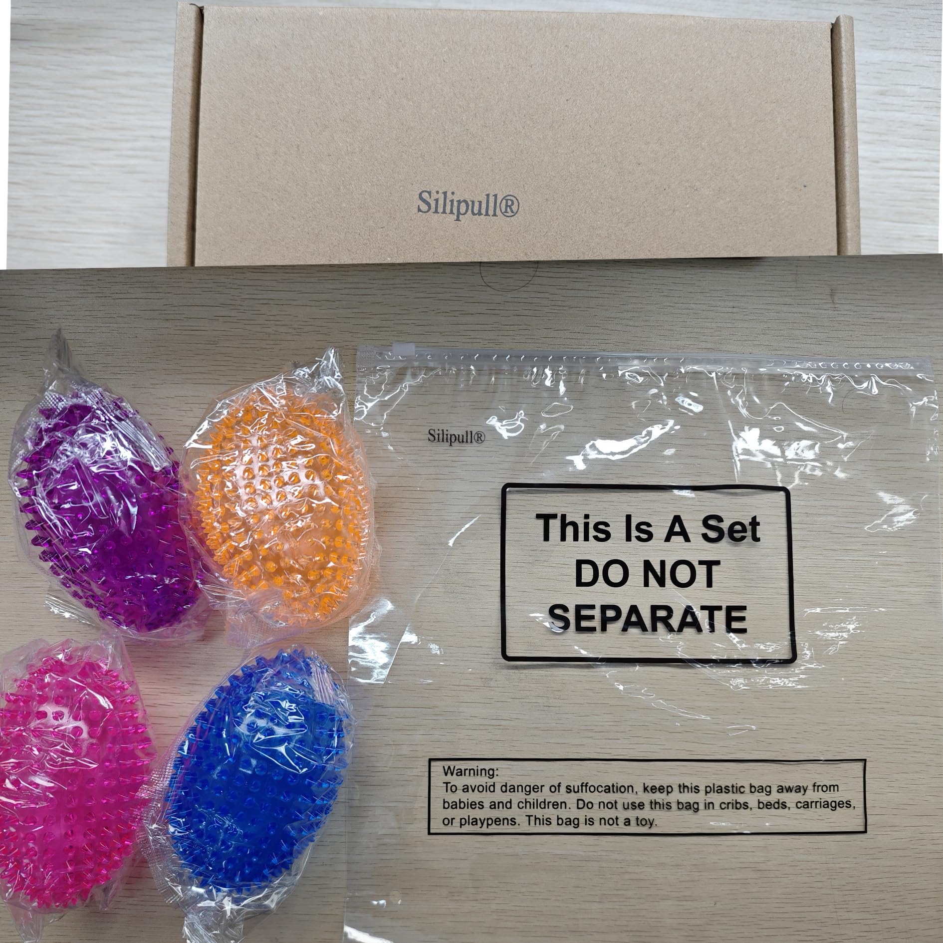 Silipull spiky football dog fetch action—engaging squeaks keep dogs active.