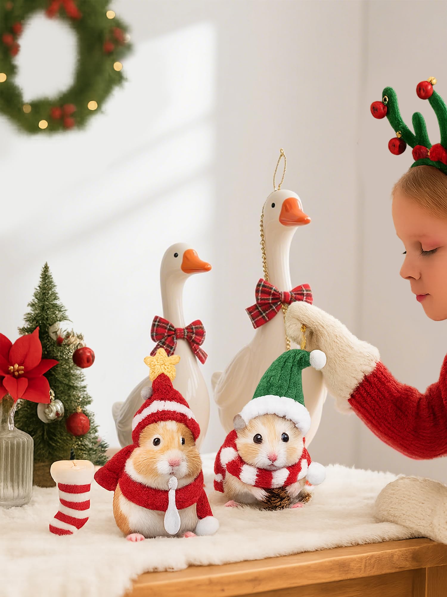 SilTriangle goose figurine display uses hats and scarves for festive accents.