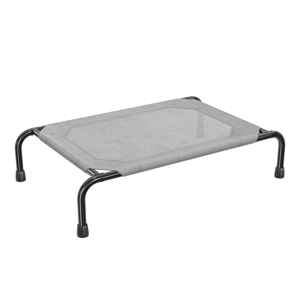 Simple Trending raised dog bed with a small dog resting on the elevated surface for cooling comfort.