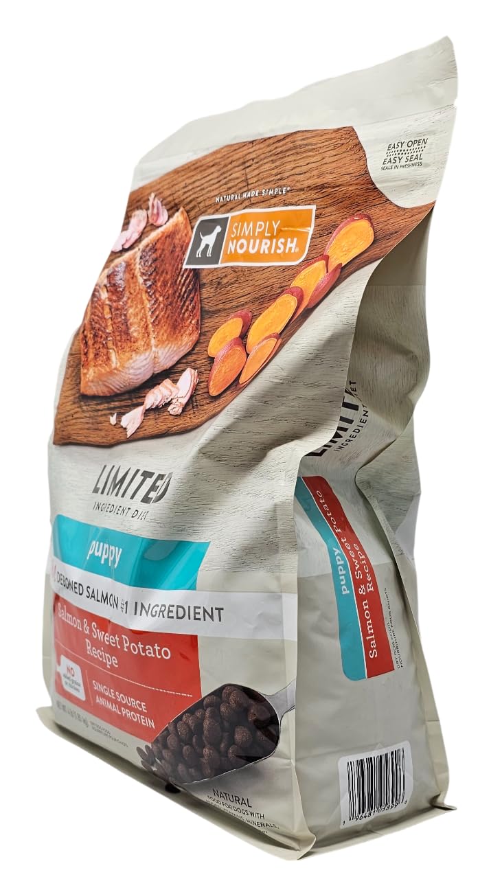 SIMPLY NOURISH salmon kibble close-up emphasizes high-quality protein for growing puppies.