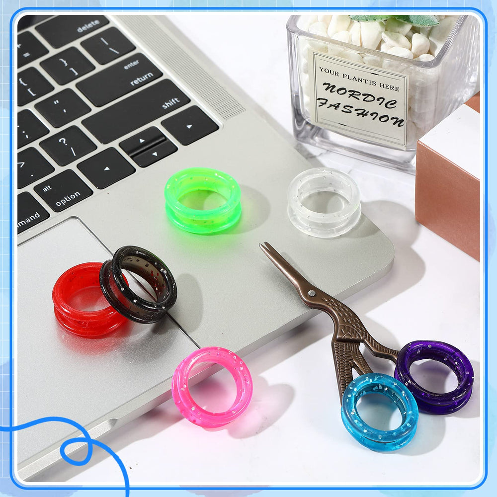 Skybooly thumb ring grips shown on scissors reduce finger fatigue during use.