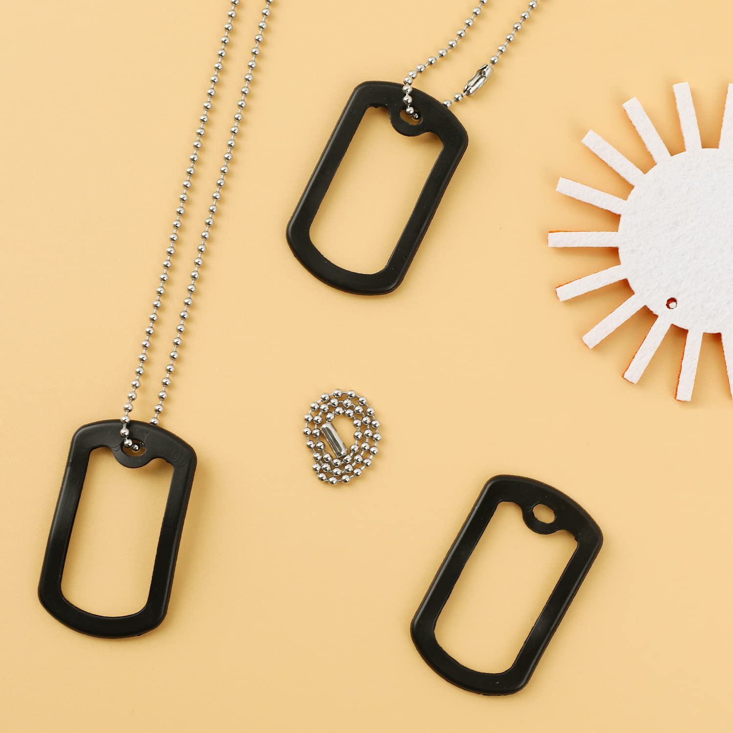 Sliverdew black dog tag protector mounted on tag reduces jingling noise.