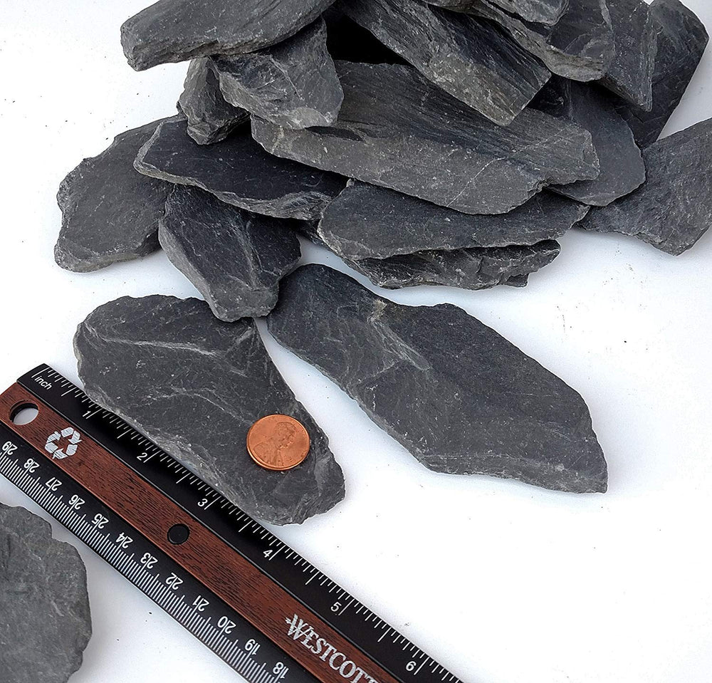 Small World Slate & Stone reptile enclosure rocks shown for heat retention and climbing.