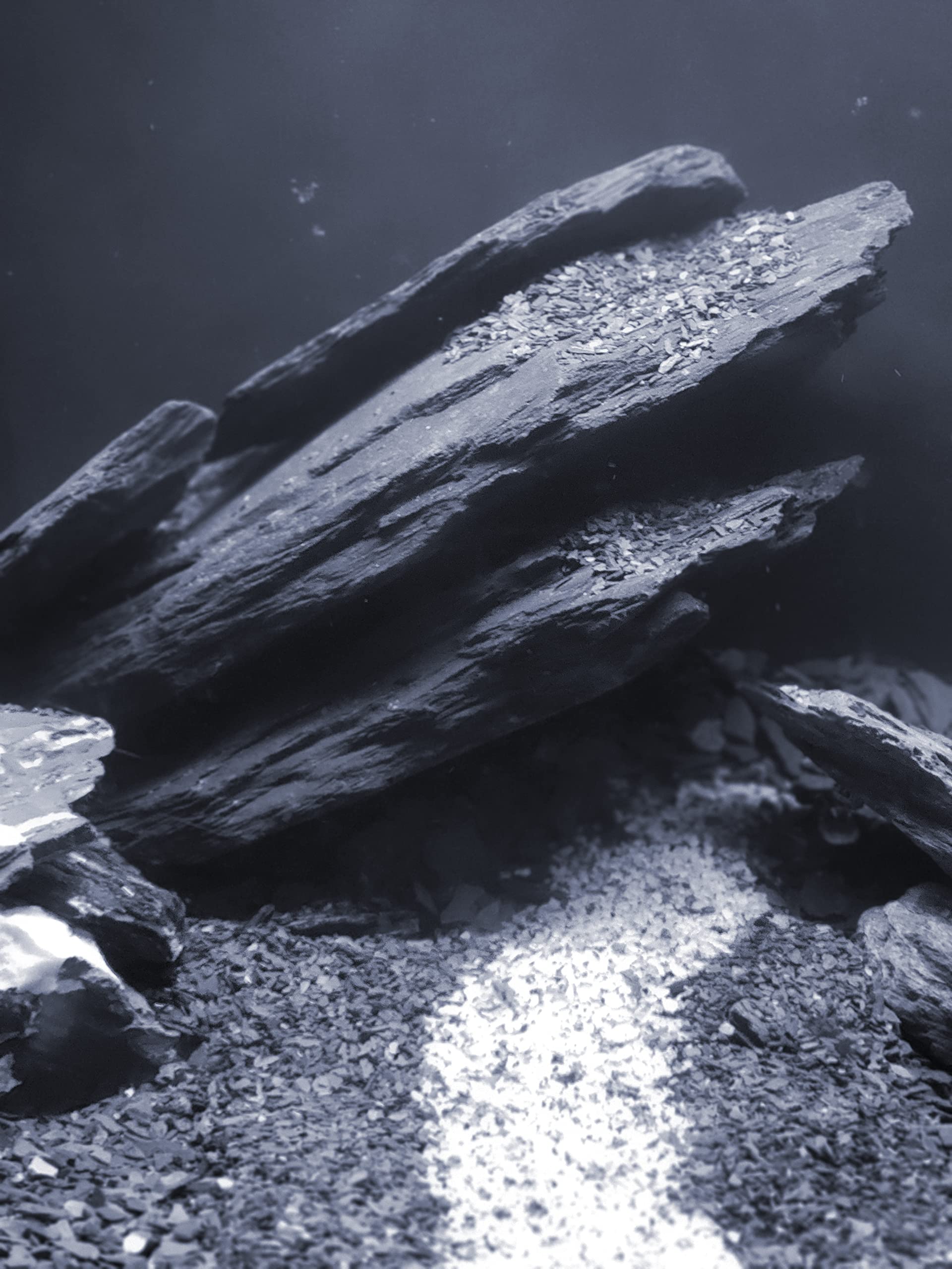 Small World Slate & Stone driftwood-attachment stone pairs with driftwood for secure setups