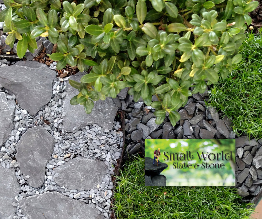Small World Slate & Stone driftwood mounting stones help secure layouts.
