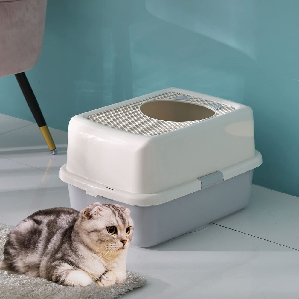 Splash-proof enclosed entry of Smart Paws litter box minimizes litter spray during use.
