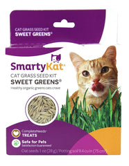 SmartyKat cat enjoying fresh greens as a natural indoor snack.