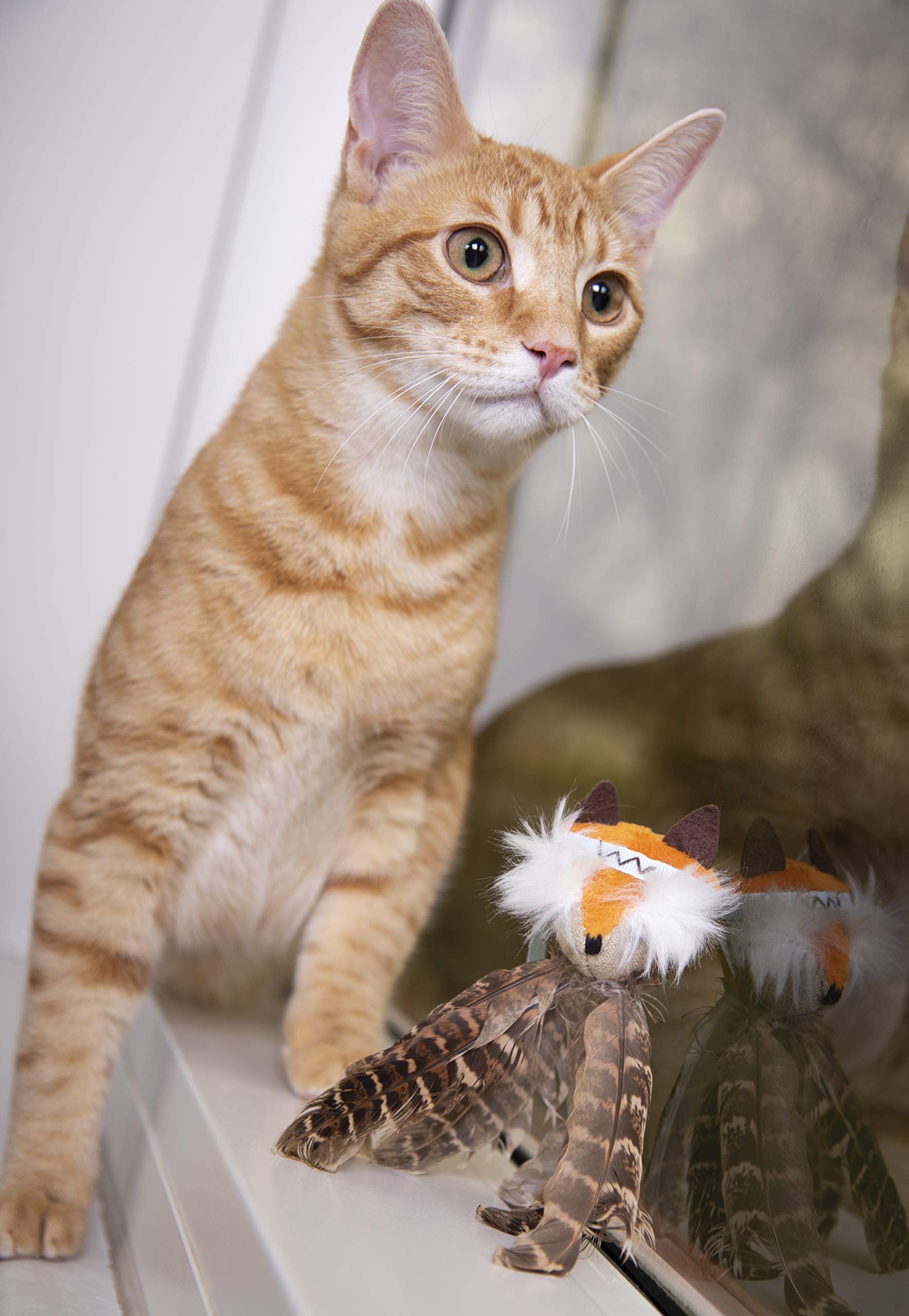 SmartyKat Toss-A-Fox white feathers-closeup emphasizes tactile textures that invite swiping.