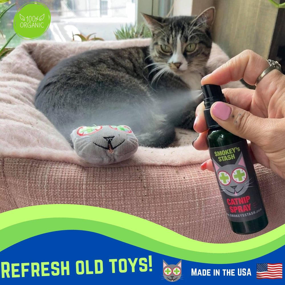 Smokey's Stash catnip spray being applied to a toy for rejuvenation.