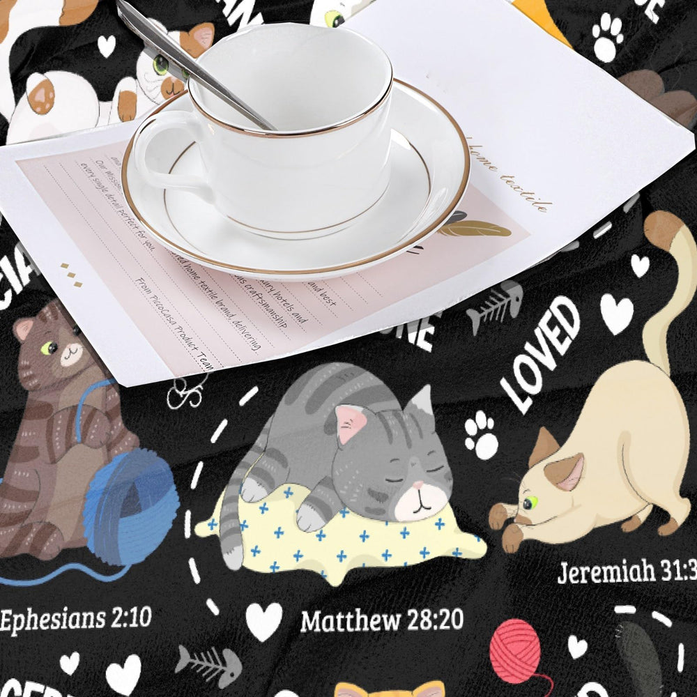 Snanna cat throw blanket-folded-on-bed ready for quick, lightweight warmth.