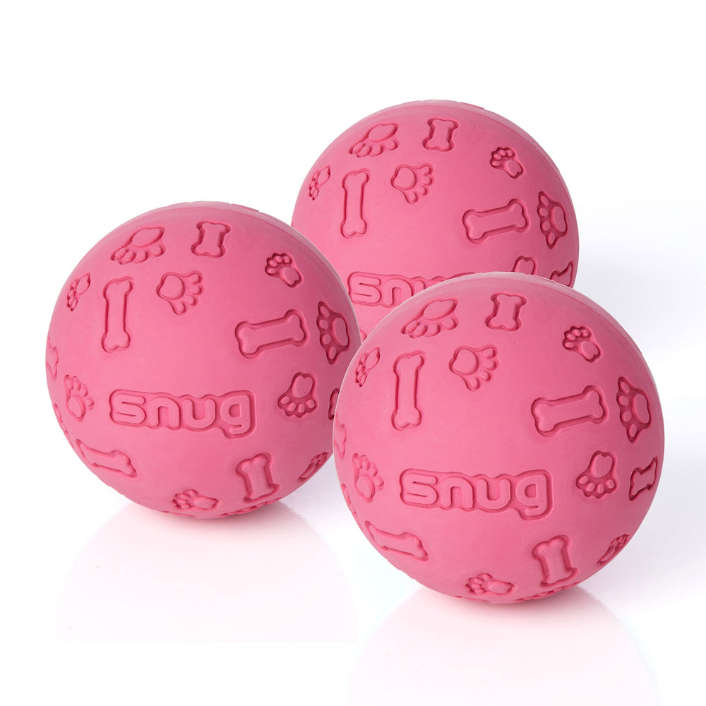 Snug rubber dog balls pink pack closeup shows durable natural rubber for fetch