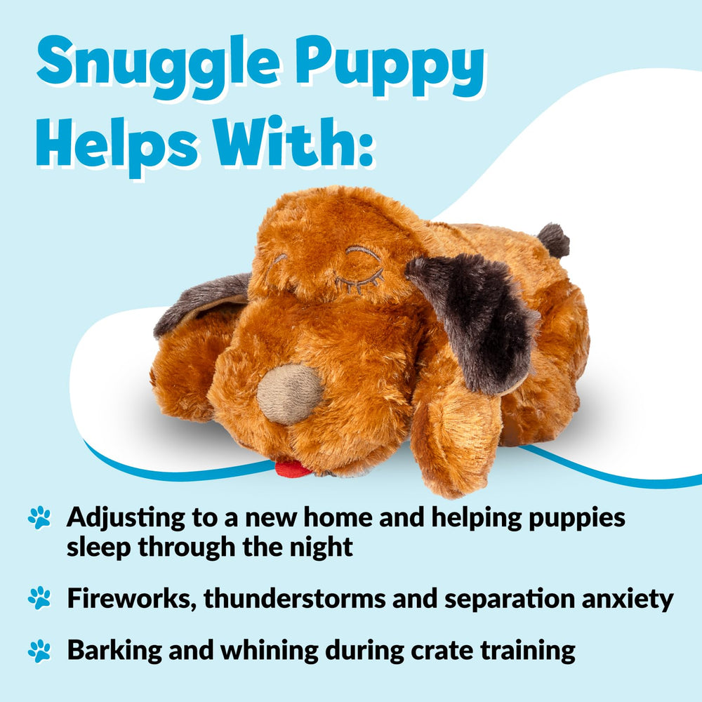 Snuggle Puppy heartbeat pulse Real-Feel image demonstrates soothing touch during bedtime routine.