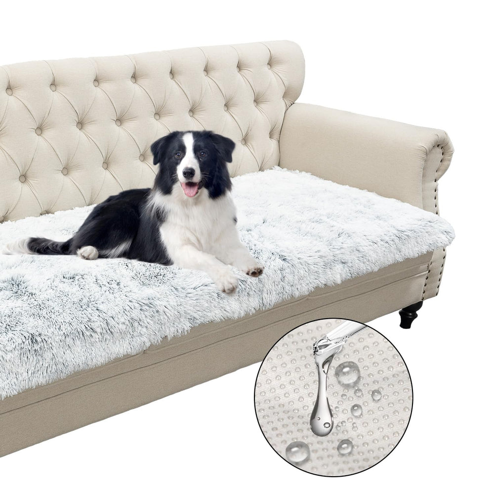 Snugglesinto bed mat plush fur 30x70 on sofa provides cozy comfort and furniture protection.