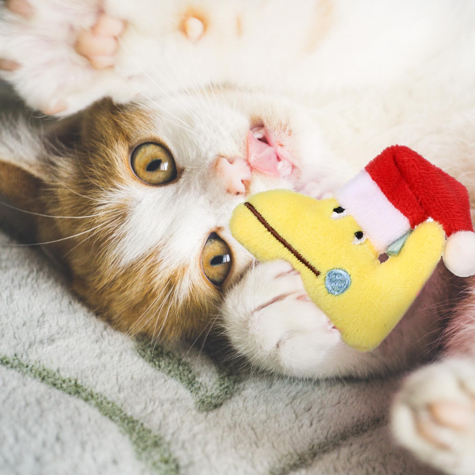 Soulchen Christmas dinosaur catnip toy Santa hat closeup for holiday fun.
