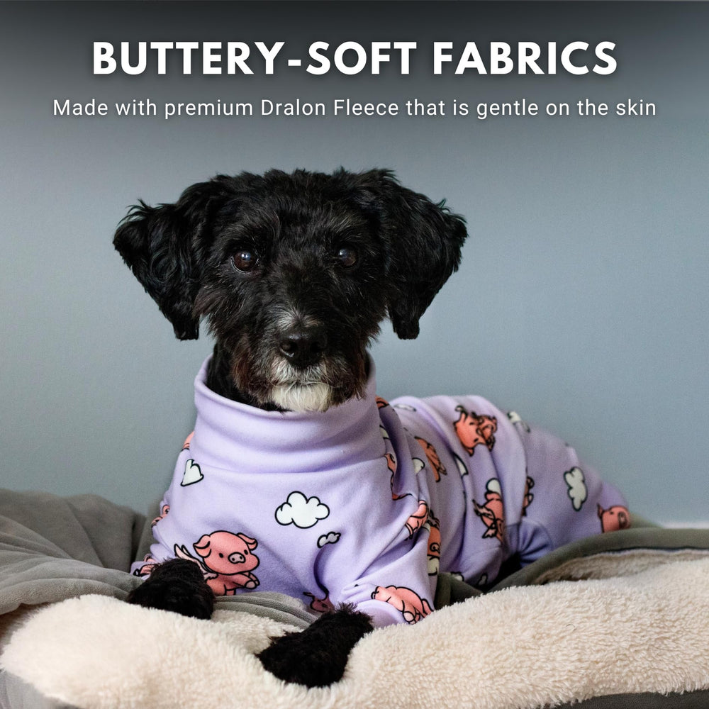 Spark Paws dog pajama worn on dog demonstrates calm, snug fit during nighttime routines.