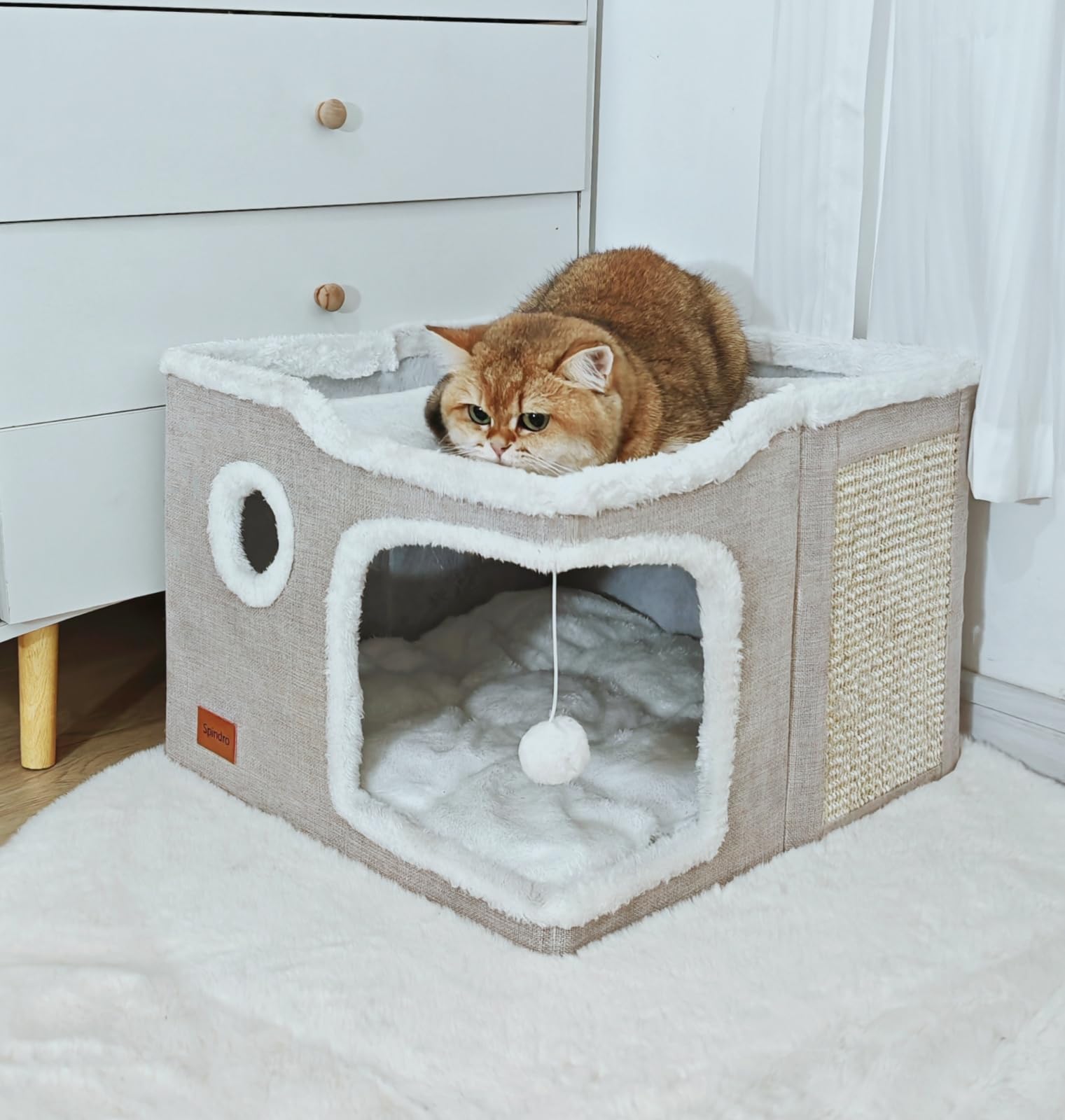 Spindro cat cave bed sherpa mat delivers cozy warmth for napping frames.