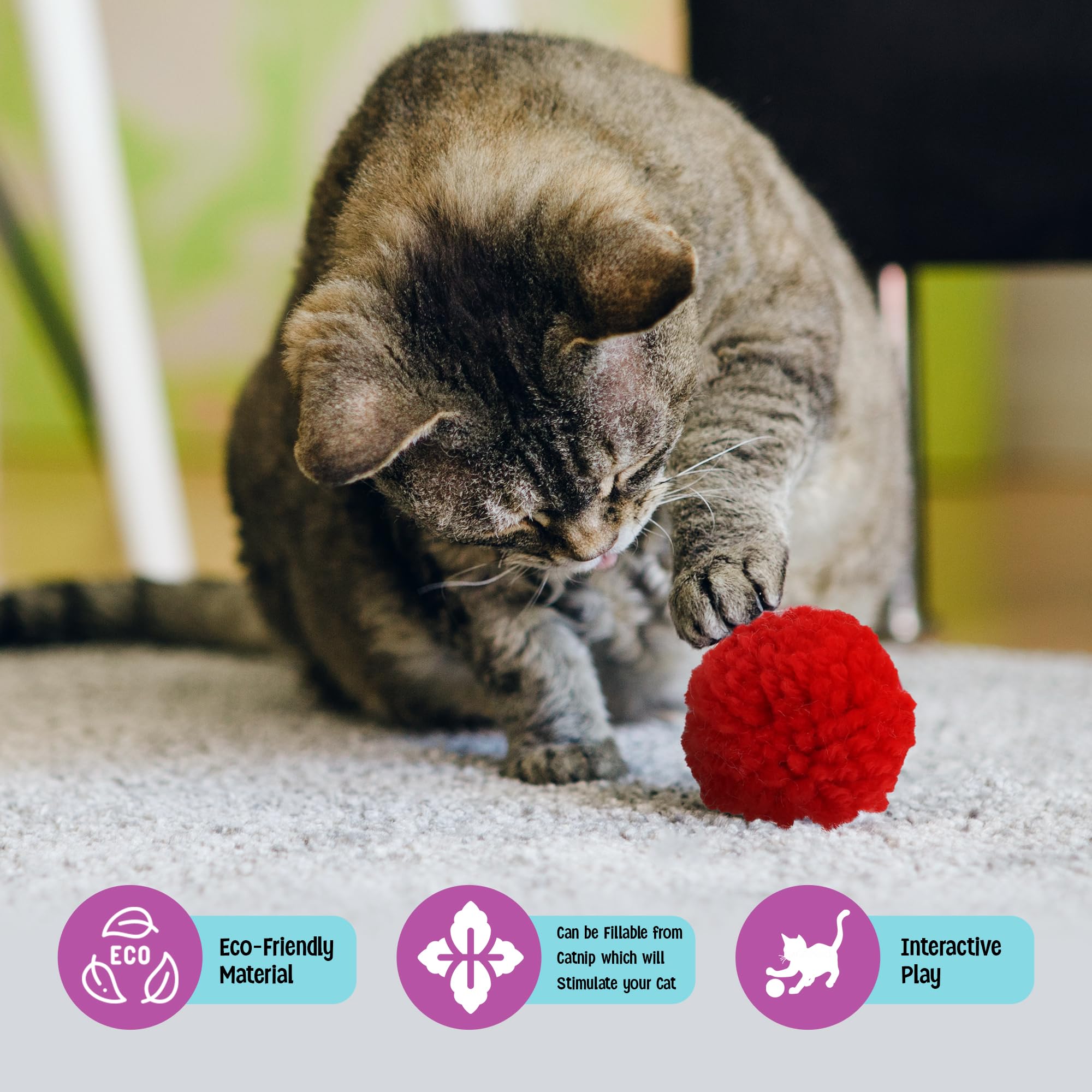 SPOT Wool Pom Poms bounce action demonstrates cats chasing and pouncing for fun.