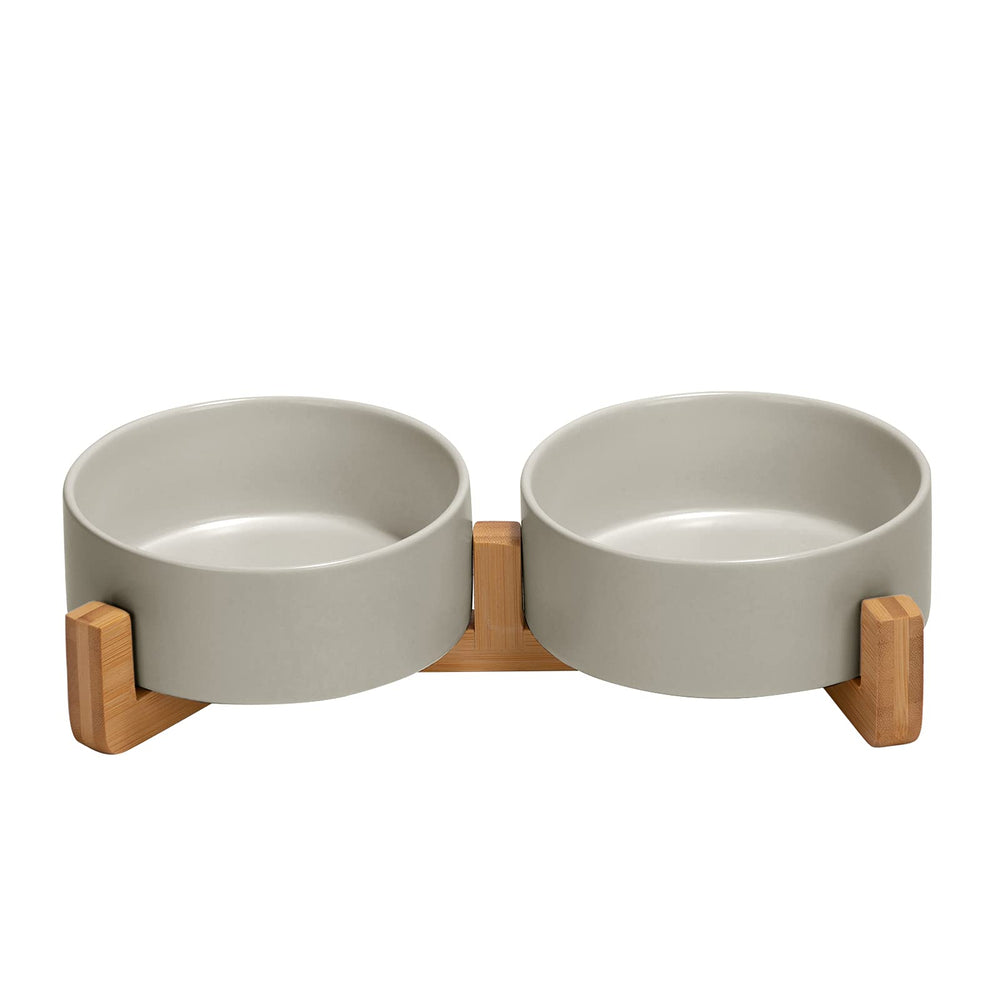 SPUNKYJUNKY ceramic bowl with wood stand – top view shows organized feeding for pets.