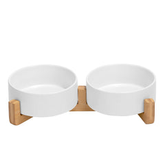 SPUNKYJUNKY ceramic dog bowl with wood stand and non-slip base for stable mealtimes.