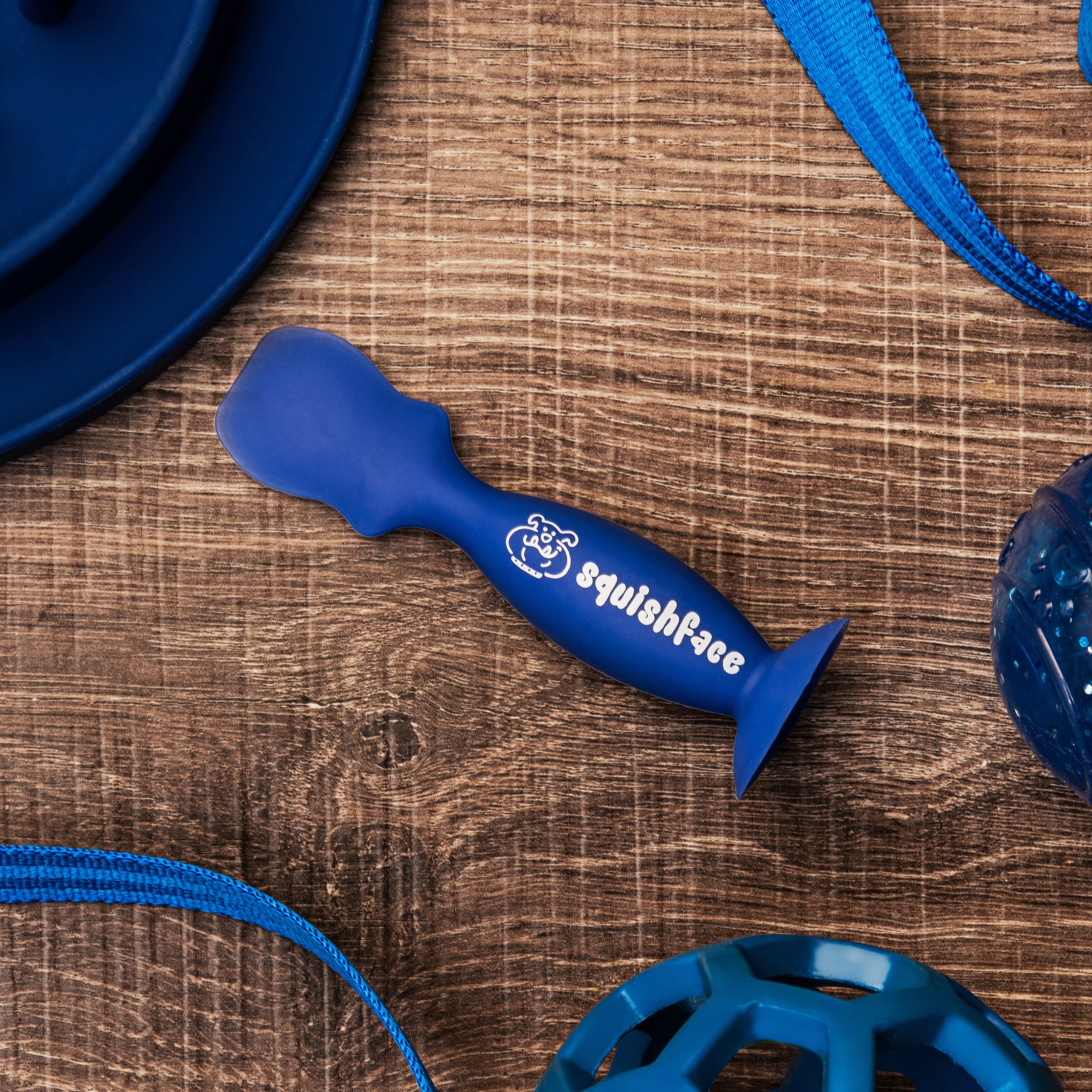 Squishface tear-stain applicator close-up shows hygienic silicone design for mess-free application.