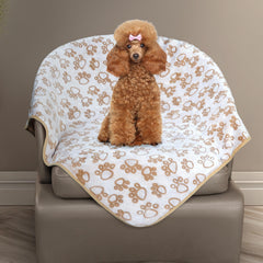 Stuffed paw-print top dog blanket provides soft comfort for daily naps.