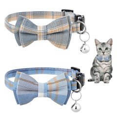 Styquenzer bow-tie cat collar in blue plaid worn on a cat, stylish and adjustable for everyday wear.