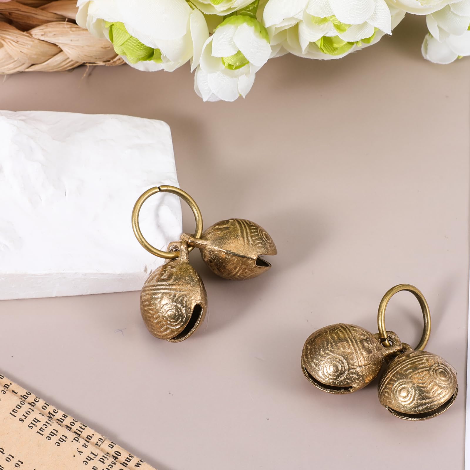 Styquenzer brass dog bell size-dimension close-up noting 26.8mm diameter and 20mm thickness.