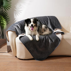 Sunheir waterproof dog blanket with soft sherpa surface provides cozy warmth on furniture