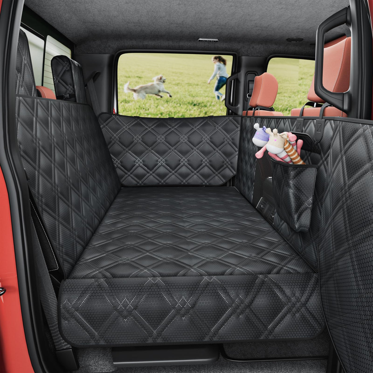 Surfcabin truck back-seat extender attached via open-door clip for easy pet entry.