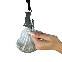 Swaggly funny dog-shaped poop bag dispenser ready for quick bag access.