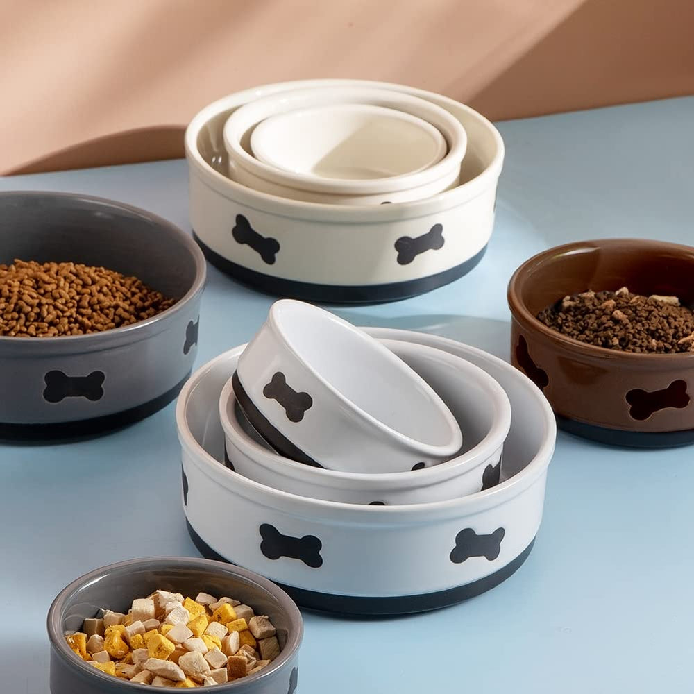 Sweejar beige porcelain pet bowl in bone pattern for everyday use.