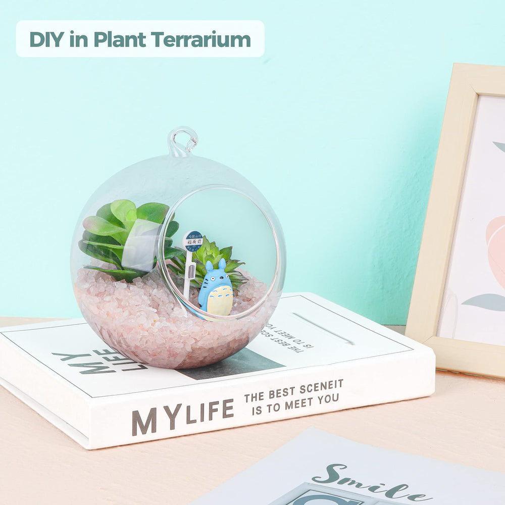 Rose quartz chips in terrarium decorate with soft glow