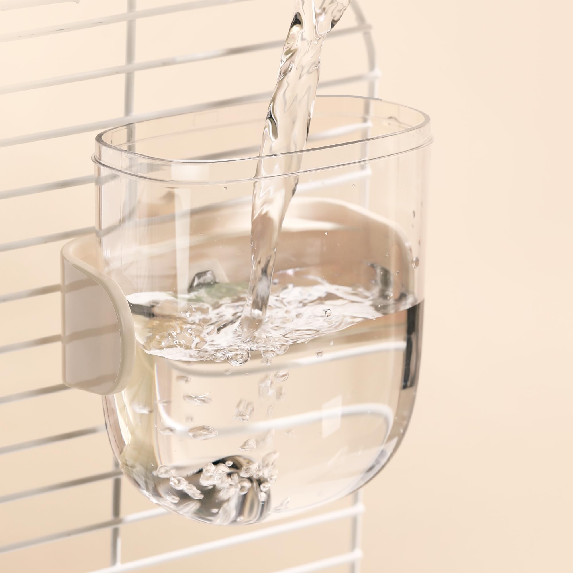 Tafit flip cap eases filling for quick cage setups.
